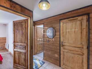 Discover the rustic charm of this property, featuring stunning wooden doors and walls that exude warmth and character.