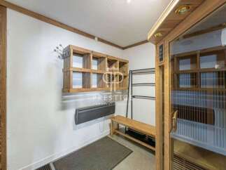 Discover a serene retreat in this property, featuring a stylish sauna for ultimate relaxation.