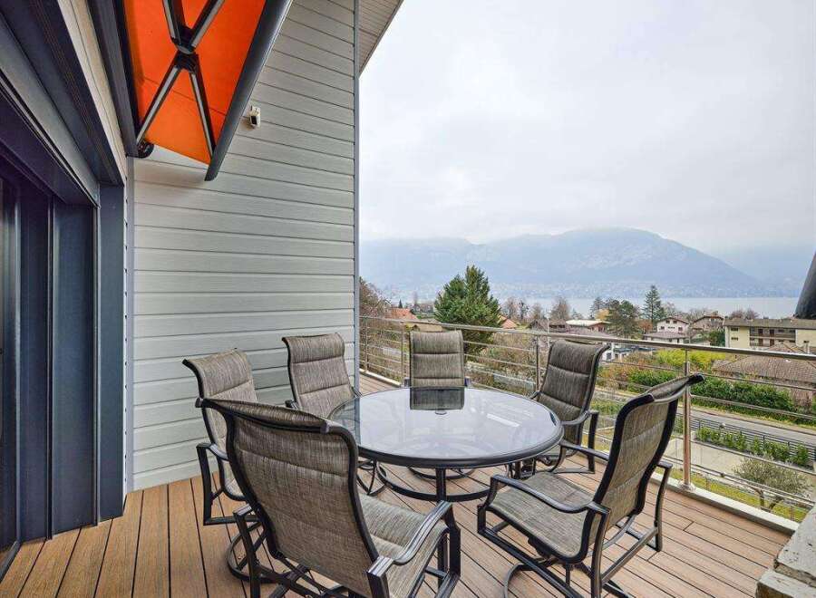 Enjoy breathtaking lake and mountain views from this stunning balcony.