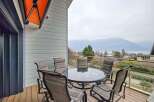 Enjoy breathtaking lake and mountain views from this stunning balcony.