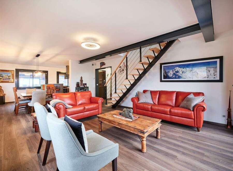 Stunning mountain views greet you from this luxurious chalet featuring a spacious open-plan living area.