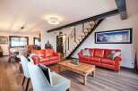 Stunning mountain views greet you from this luxurious chalet featuring a spacious open-plan living area.