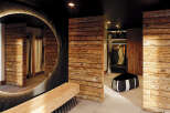 This luxurious property boasts a stunning interior design with rustic wooden accents throughout.