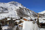 Discover the charm of this snow-covered village nestled in the mountains.