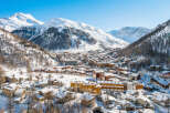 Experience the charm of a snow-covered village nestled in the heart of the Alps.