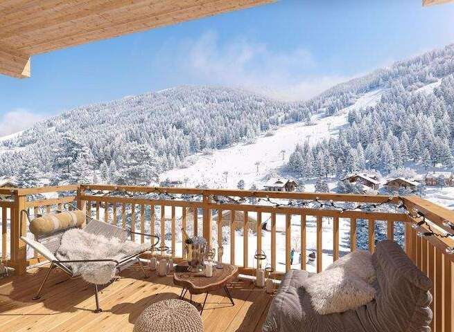 Enjoy breathtaking mountain views from this cozy balcony.