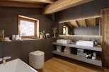 Experience rustic elegance in this stunning bathroom.