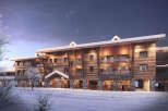 Experience the charm of this stunning ski resort property, featuring a beautiful wooden facade and inviting balconies.