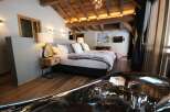 Experience luxury in this stunning bedroom featuring a unique, modern design.