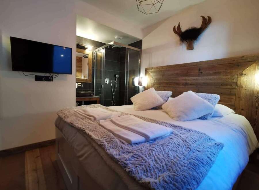 Experience rustic charm in this cozy bedroom.