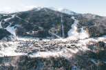 Discover a stunning mountain property nestled in a picturesque winter wonderland.