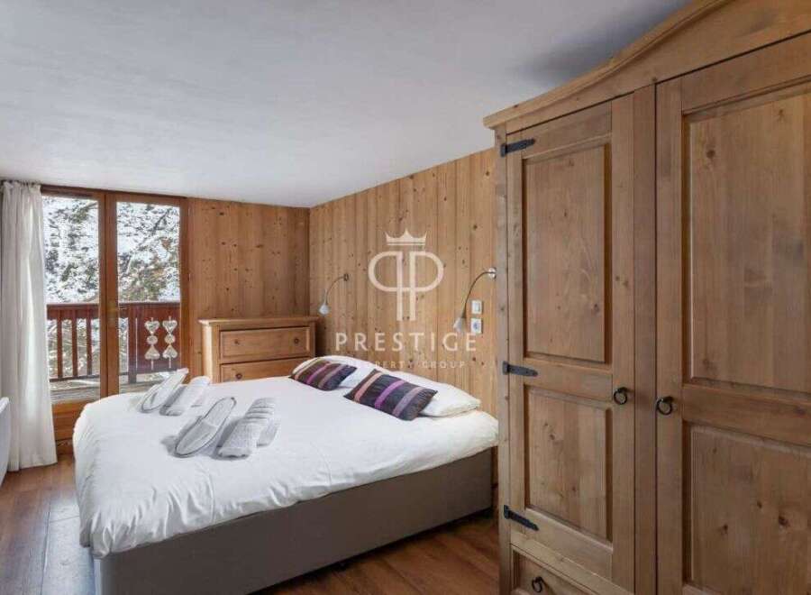 Discover a cozy bedroom retreat with rustic wooden accents.