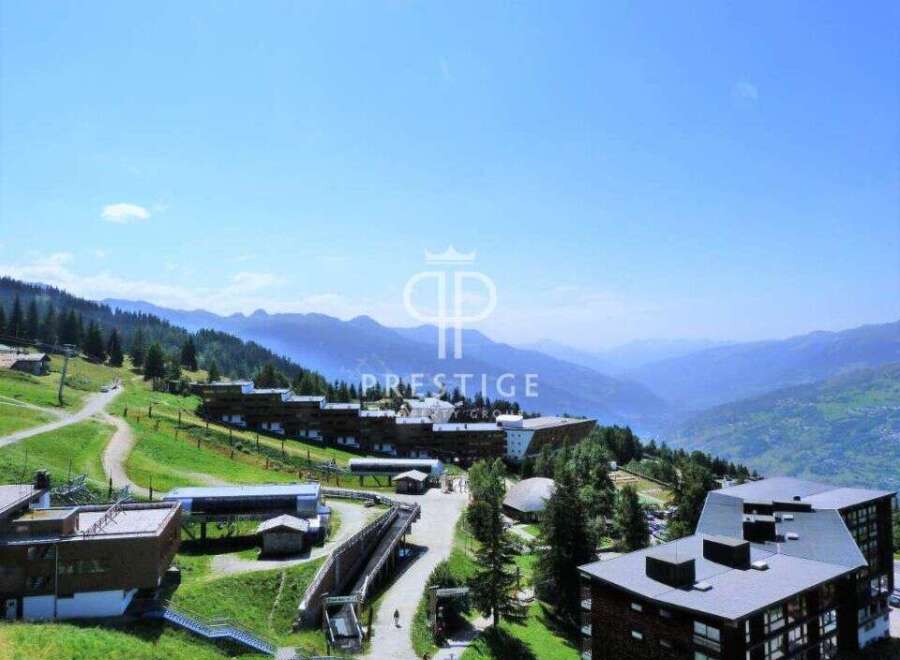Experience breathtaking mountain views from this stunning property.