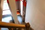 Discover a stunning property featuring a beautifully designed staircase.