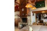 Rustic charm meets modern comfort in this stunning property.