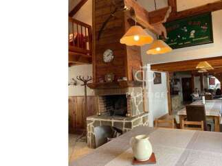 Rustic charm meets modern comfort in this stunning property.