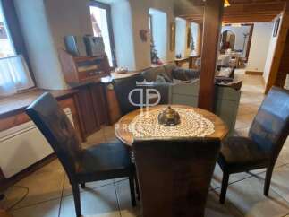 Discover the charm of this property, featuring a cozy dining area perfect for intimate gatherings.