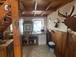 Charming rustic kitchen with wooden accents and a cozy atmosphere.