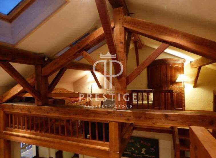 Discover the charm of this property with its stunning wooden beams and unique architectural design.