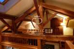 Discover the charm of this property with its stunning wooden beams and unique architectural design.
