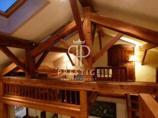 Discover the charm of this property with its stunning wooden beams and unique architectural design.