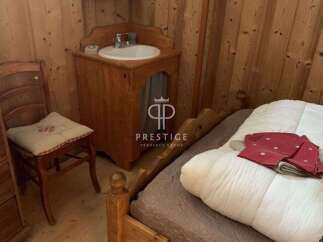 Charming rustic bedroom with wooden accents.