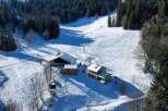 Discover a stunning property nestled in a picturesque winter wonderland.