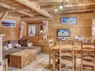 Experience the charm of this cozy wooden cabin, perfect for a relaxing getaway.