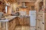 Step into rustic charm with this cozy kitchen.