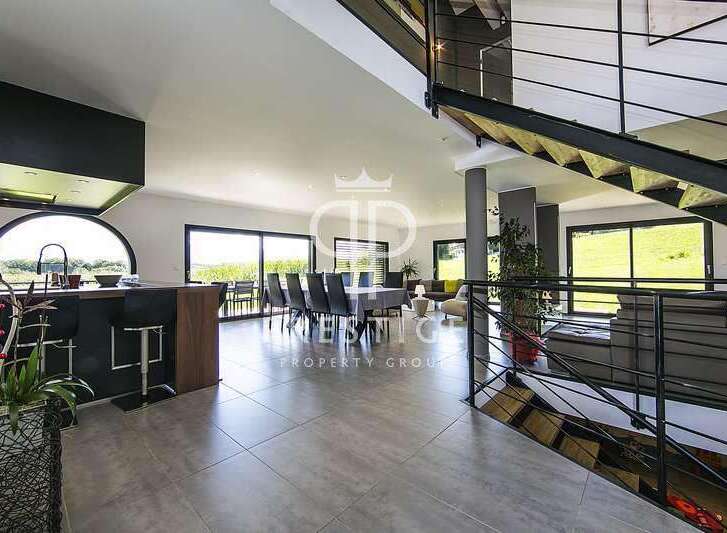Discover luxury living in this stunning property! Featuring a modern kitchen with sleek design and a spacious dining area perfect for entertaining.