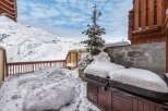 Experience the ultimate winter escape in this stunning property.