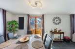 Discover the charm of this property, featuring a stylish dining area perfect for gatherings.