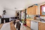 Discover this charming property featuring a cozy living space and a well-equipped kitchen.
