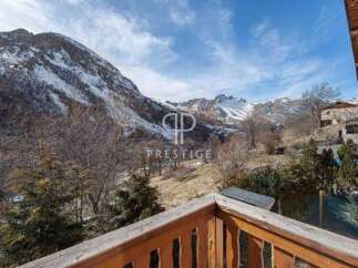 Experience breathtaking mountain views from this stunning property.