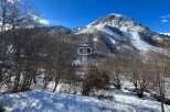 Discover a stunning property nestled in a picturesque mountain landscape.