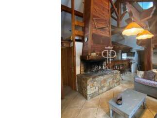 Discover the charm of this stunning property, featuring a cozy fireplace perfect for chilly evenings.