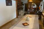 Discover the charm of this property, featuring a cozy dining area perfect for gatherings.