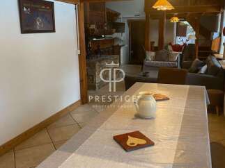 Discover the charm of this property, featuring a cozy dining area perfect for gatherings.