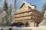 Discover the charm of this stunning mountain property, featuring a unique architectural design with multiple balconies.