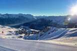 Enjoy breathtaking mountain views and pristine ski slopes in this stunning winter landscape.