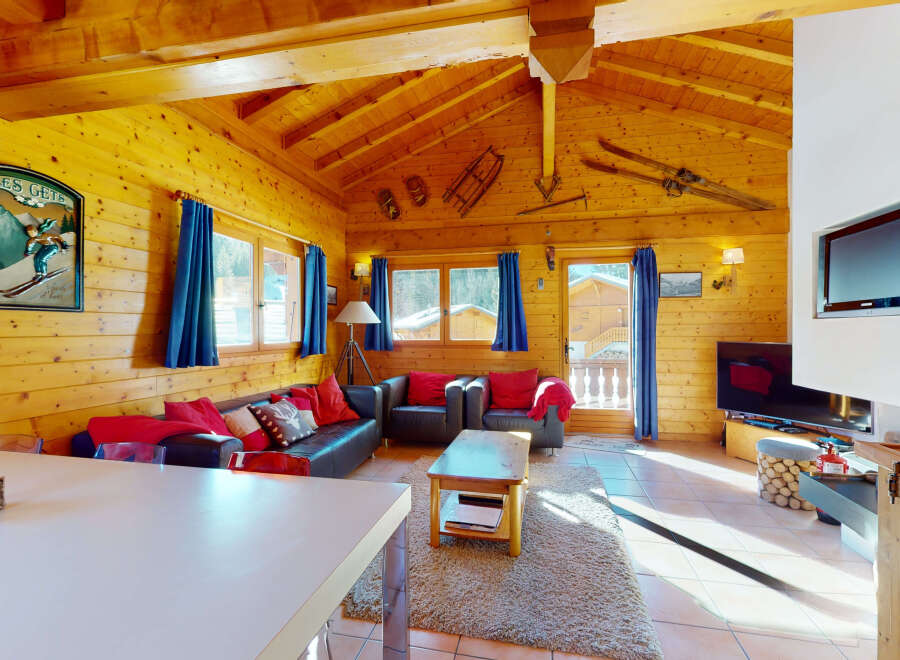 Experience the charm of a cozy wooden cabin, perfect for a mountain getaway.