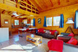 Experience the warmth of this charming wooden cabin, perfect for a cozy getaway.