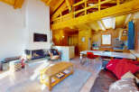 Experience the charm of this cozy chalet, featuring a stunning wooden interior and a warm, inviting atmosphere.