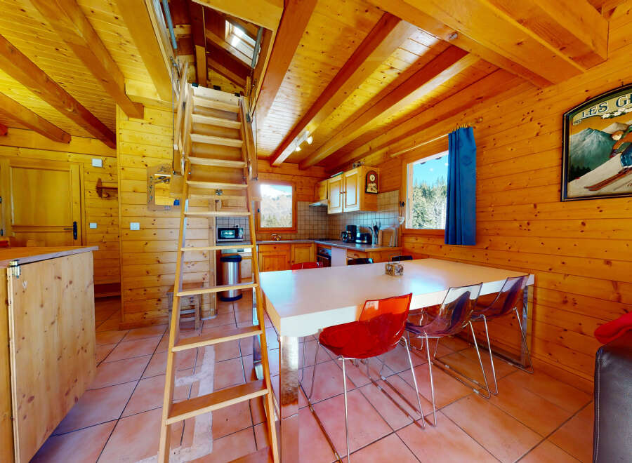 Step into this charming wooden cabin, perfect for a cozy getaway.