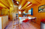 Step into this charming wooden cabin, perfect for a cozy getaway.