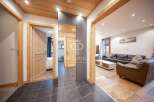 Discover the charm of this property, featuring a warm and inviting interior with wooden accents throughout.