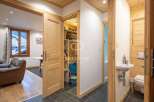 Discover the charm of this property, featuring a warm and inviting interior with wooden accents throughout.