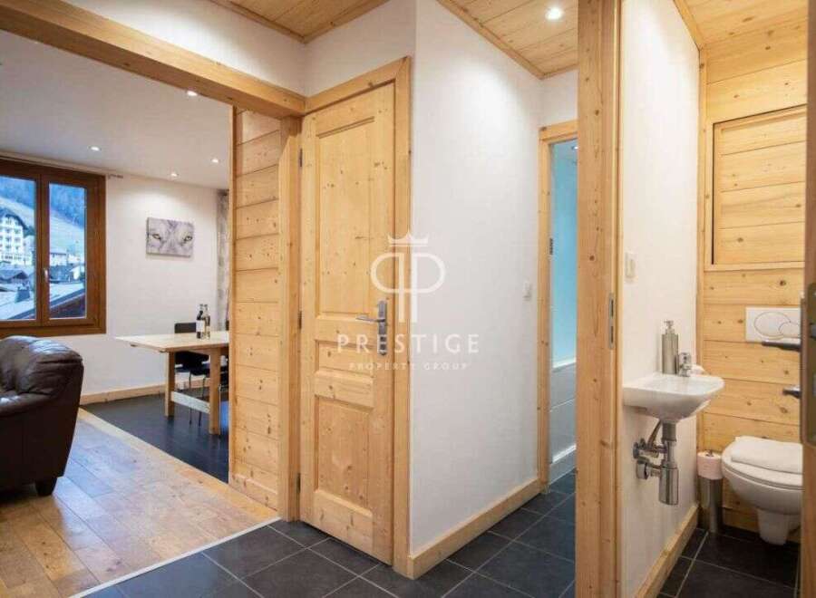 Discover the charm of this stunning property, featuring exquisite wooden accents throughout.