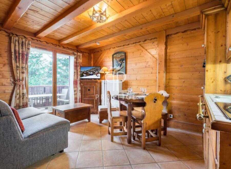 Experience the charm of this cozy wooden chalet, perfect for a relaxing getaway.