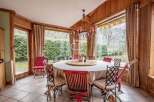 Discover the charm of this dining room, featuring a round table perfect for gatherings.
